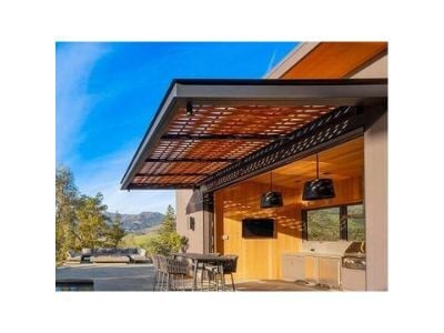 Mataverde SaferWood thermally modified Hem-Fir siding, fire-treated real wood siding that is WUI certified. shown here on the exterior and interior of an outdoor poo lhouse including pergola overhang