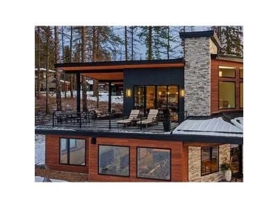 Mataverde Thermally Modified Wood Decking on a rooftop deck and façade on a mountainside ski lodge